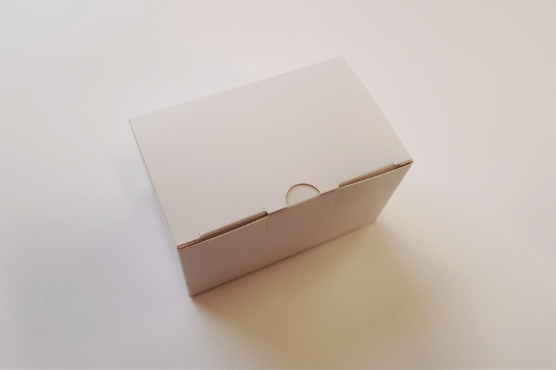 Овальная коробка из картона цвета шампань 160х110х30мм S